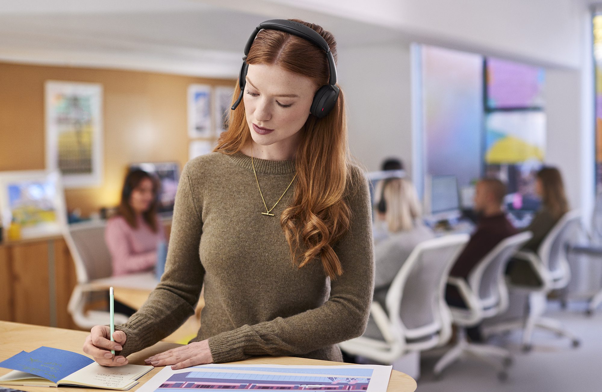 Jabra Evolve2 65 Flex Female Working in Office Medium